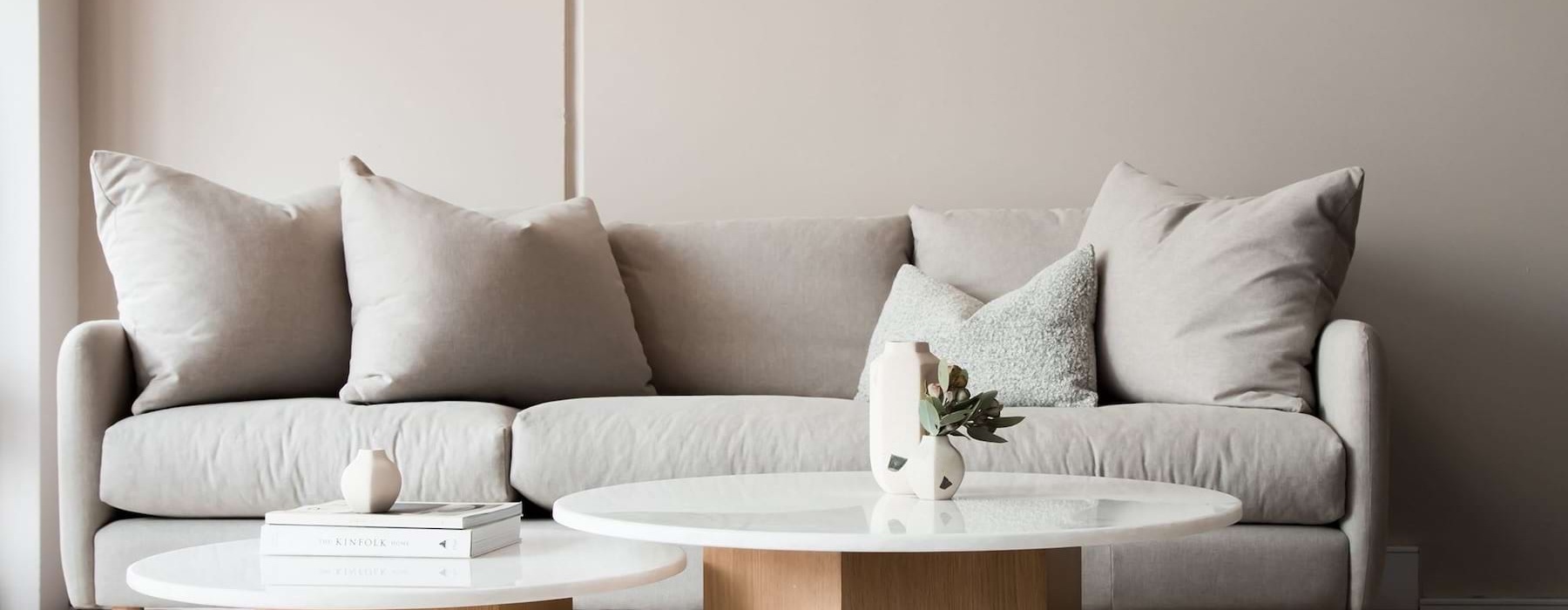 A living room with a couch and a coffee table at Eagle Point apartments in Tulsa, Oklahoma.